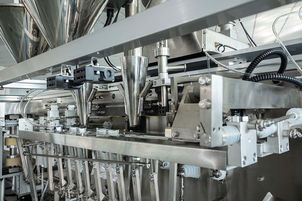 INMAYPACK horizontal pouch filling funnels and multi-station transfer system