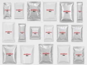 Various sizes of silver foil pouches, stick packs, and flat sachets with INMAYPACK logo
