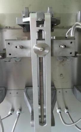 Mechanical pouch opening jaw adjustment used during pouch machine format change