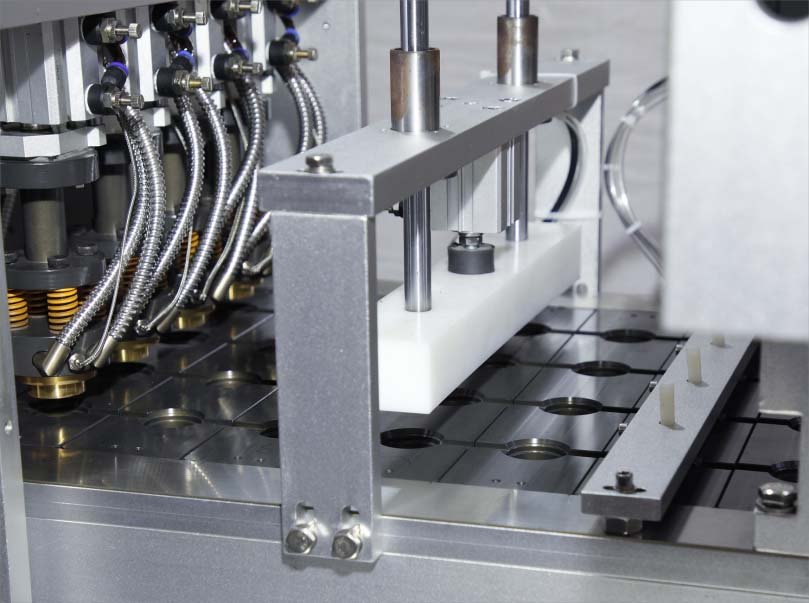 Capsule tooling and indexing plate detail